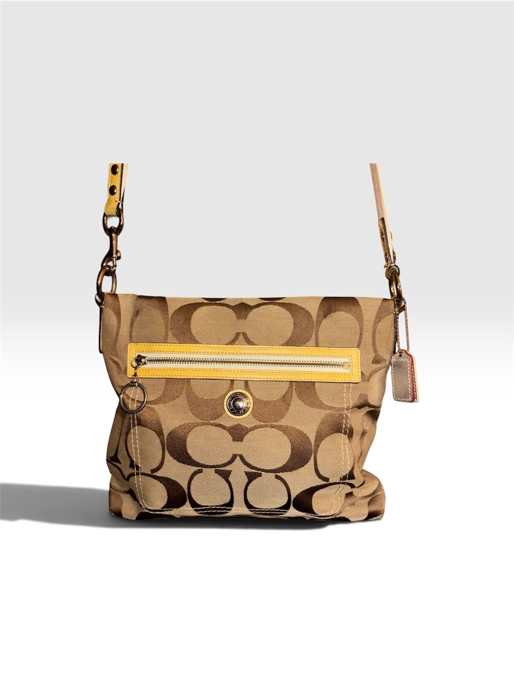 Coach Daisy F14869 Signature Canvas Crossbody Bag in Brown with Yellow Trim